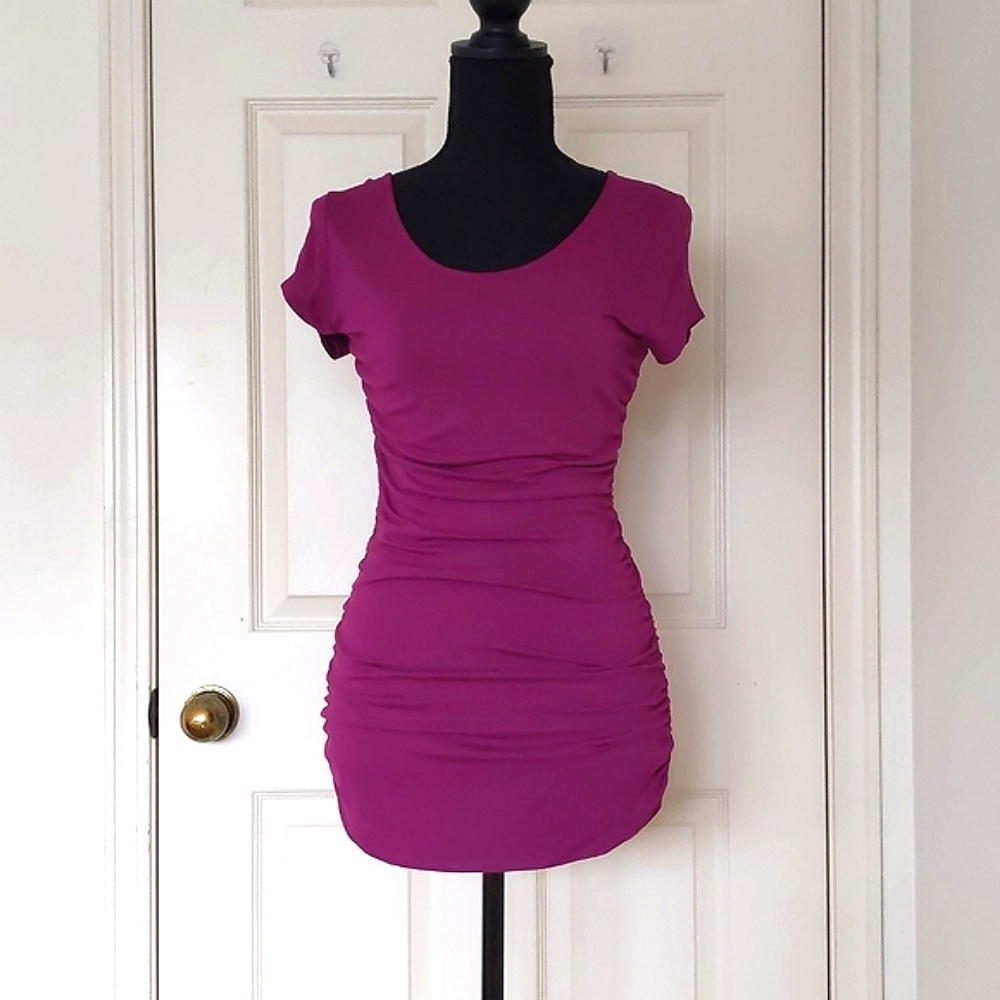 NWT. The Limited Rayon and Spandex Short Sleeve Long Blouse w/sides all elastic.